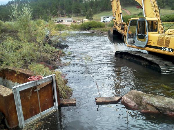 Justin doing Diversion Construction Work by Chaparral Construction